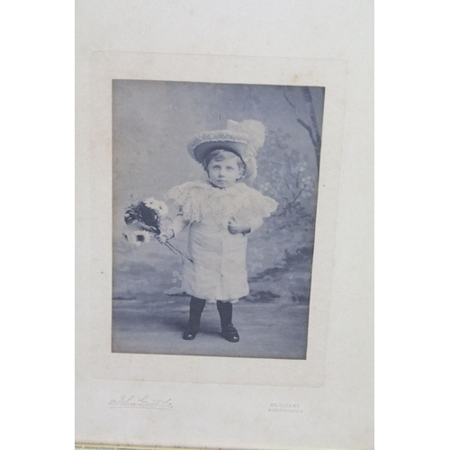 619 - Three Victorian photographs, comprising: young boy with flowers by John Griffiths, Sheerness, 13.5 x... 