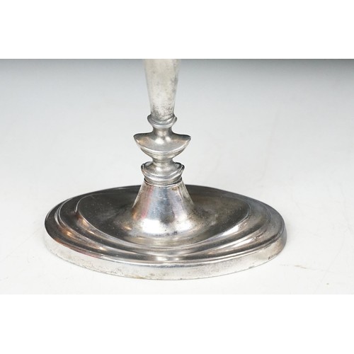 141 - Pair of silver plated three branch candelabra, each 29cm high