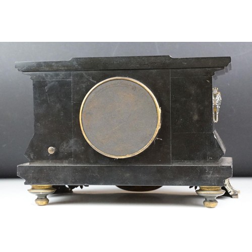 143 - Victorian slate mantel clock the dial with brass roman numerals, the case with classical masks and b... 