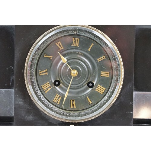 143 - Victorian slate mantel clock the dial with brass roman numerals, the case with classical masks and b... 