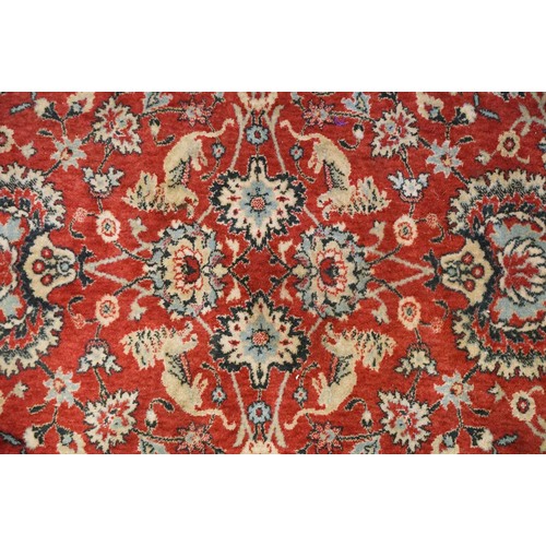 764 - Large red and blue ground carpet, 345 x 252cm