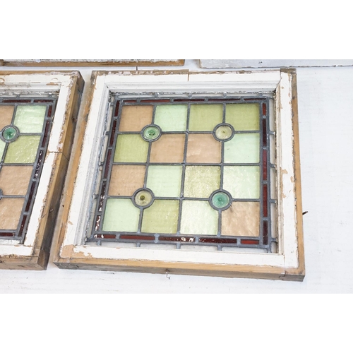 518 - Five stained glass window panels, the largest 73 x 50cm overall