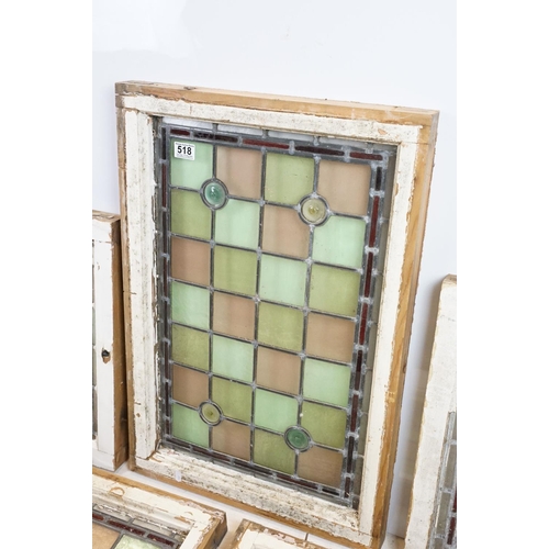 518 - Five stained glass window panels, the largest 73 x 50cm overall