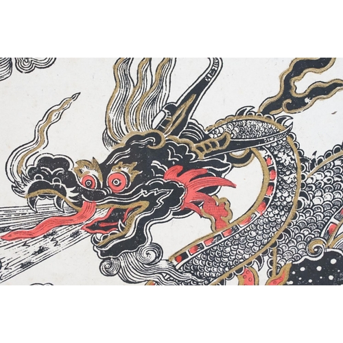 572 - Asian woodblock print on rice paper of a Chinese dragon, highlighted in gold and red, signed T. Muni... 