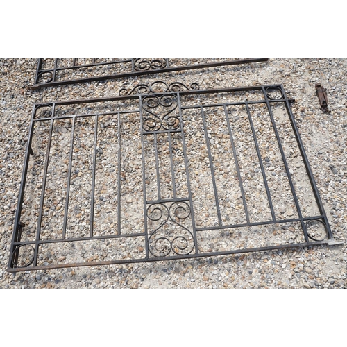 624 - Black painted wrought iron driveway gate (approx 292cm wide), together with a metal garden gate