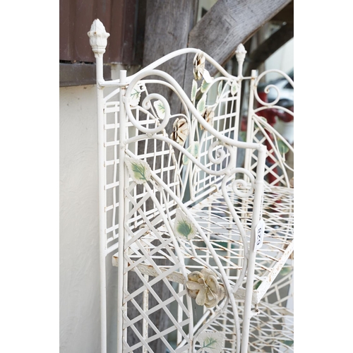 628 - Four shelf metal garden plant stand with ornate flower decoration, approx 163cm high x 670cm wide