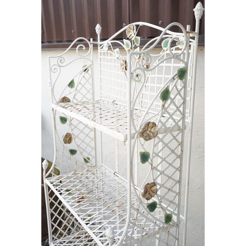 628 - Four shelf metal garden plant stand with ornate flower decoration, approx 163cm high x 670cm wide