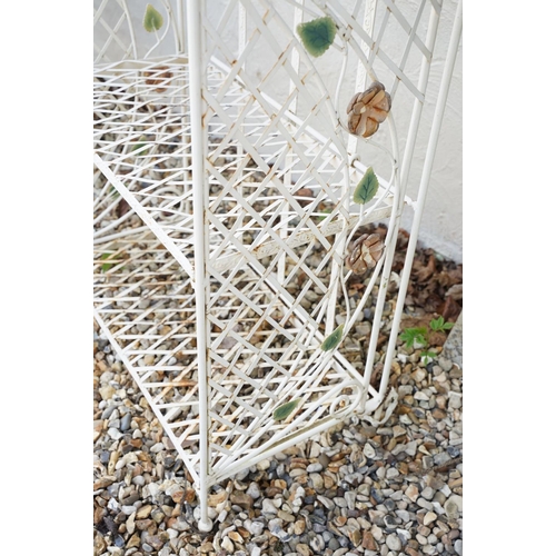 628 - Four shelf metal garden plant stand with ornate flower decoration, approx 163cm high x 670cm wide