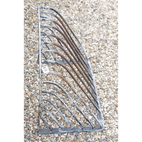 632 - Iron wall mounting hay rack, approx 67cm wide