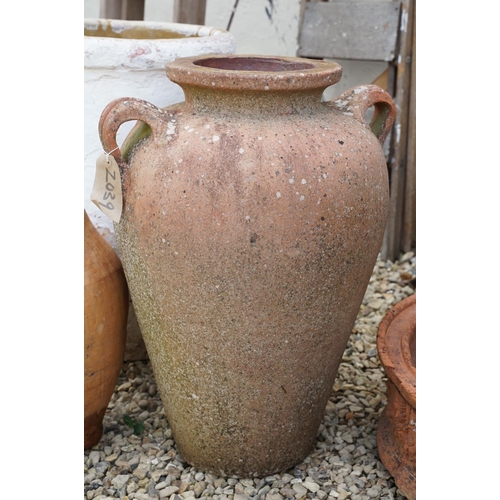 635 - Group of three terracotta garden urns / planters, the tallest approx 70cm