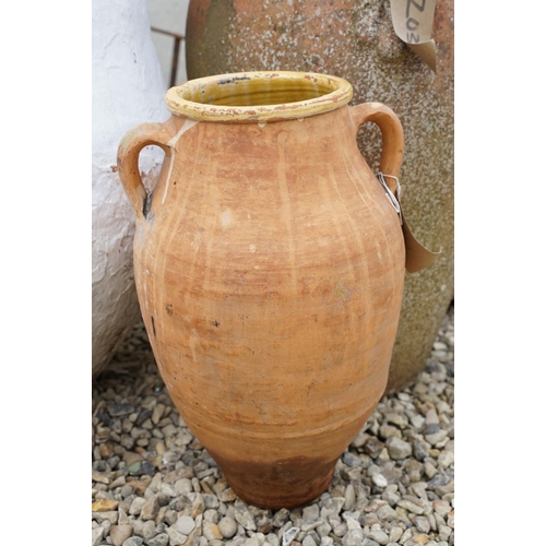 635 - Group of three terracotta garden urns / planters, the tallest approx 70cm