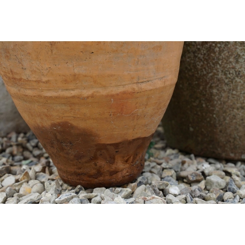 635 - Group of three terracotta garden urns / planters, the tallest approx 70cm