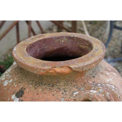 635 - Group of three terracotta garden urns / planters, the tallest approx 70cm