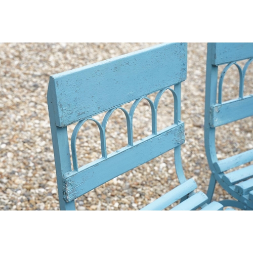 639 - Set of four blue painted slatted wooden garden patio chairs raised on metal legs with scrolled detai... 