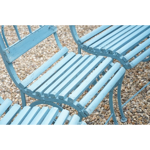 639 - Set of four blue painted slatted wooden garden patio chairs raised on metal legs with scrolled detai... 