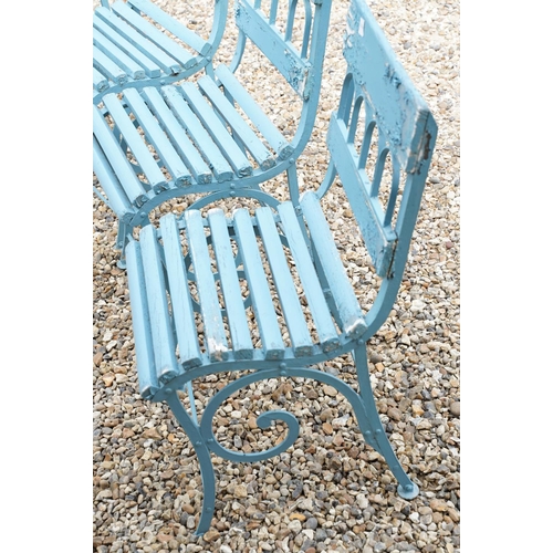 639 - Set of four blue painted slatted wooden garden patio chairs raised on metal legs with scrolled detai... 