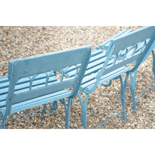 639 - Set of four blue painted slatted wooden garden patio chairs raised on metal legs with scrolled detai... 