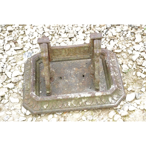 641 - Cast iron boot scraper with leaf detail to the octagonal base, approx 35cm wide