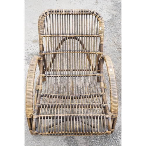 648 - Pair of wicker low conservatory chairs, each raised on four supports, approx 82cm high