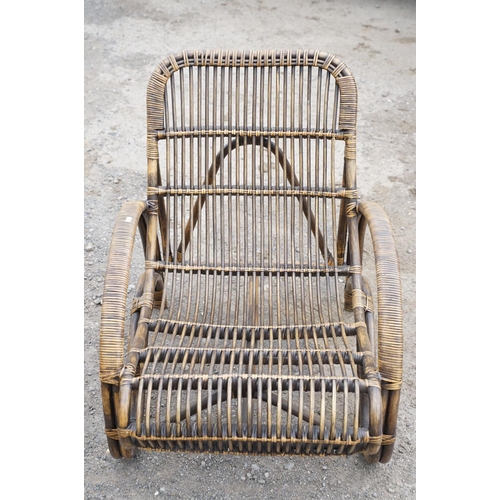 648 - Pair of wicker low conservatory chairs, each raised on four supports, approx 82cm high