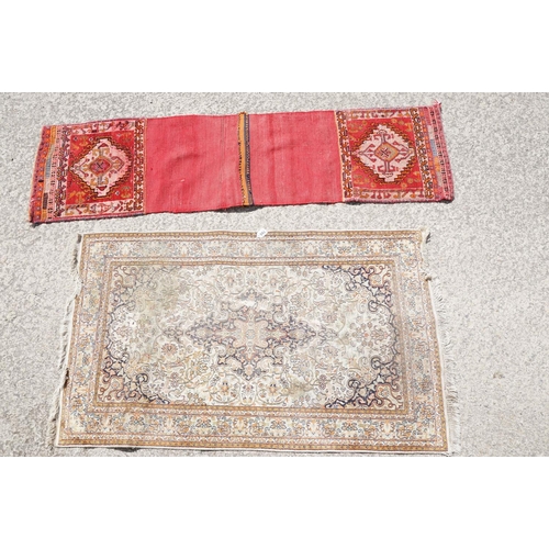 766 - Middle Eastern cream ground carpet, with central stylised motif within geometric borders, 160 x 92cm... 