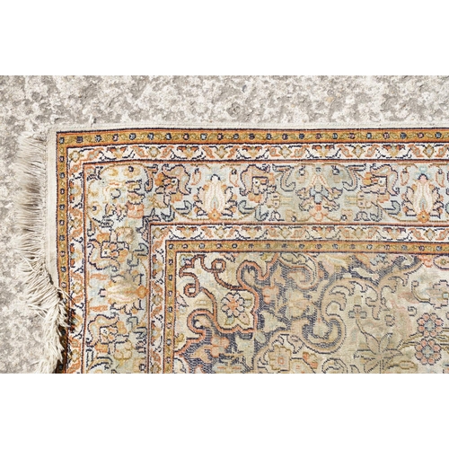 766 - Middle Eastern cream ground carpet, with central stylised motif within geometric borders, 160 x 92cm... 