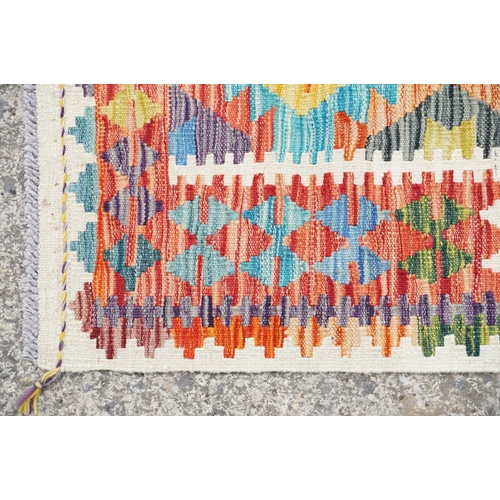 772 - Chobi Kilim rug, cream ground, with fringed edges, approx 125cm x 83cm