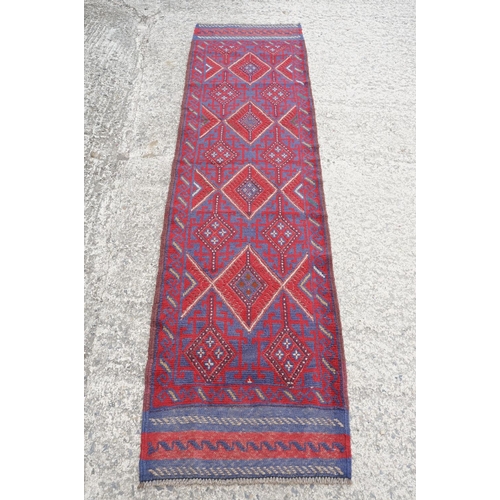 780 - Meshwani red & blue ground runner rug, approx 245cm x 61cm