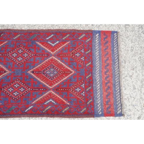 780 - Meshwani red & blue ground runner rug, approx 245cm x 61cm