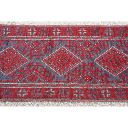 781 - Meshwani red & blue ground runner rug, approx 257cm x 54cm