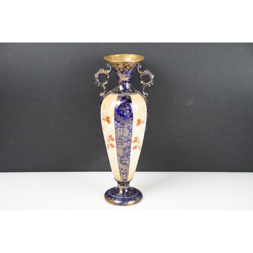 85 - Krug Champagne twin-handled glass bucket, together with a 19th century baluster vase with floral ivo... 