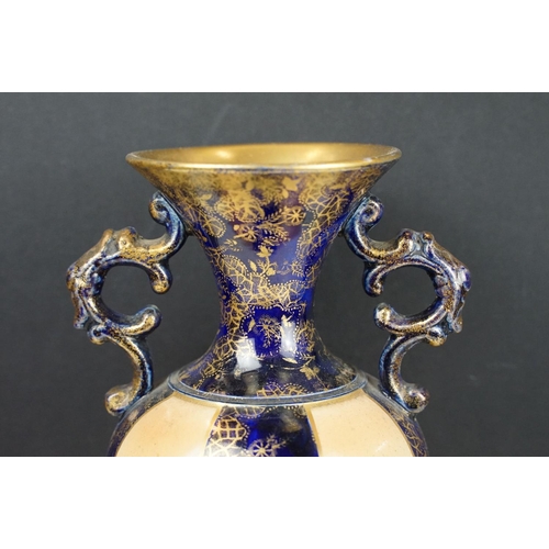 85 - Krug Champagne twin-handled glass bucket, together with a 19th century baluster vase with floral ivo... 