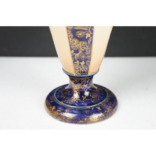 85 - Krug Champagne twin-handled glass bucket, together with a 19th century baluster vase with floral ivo... 