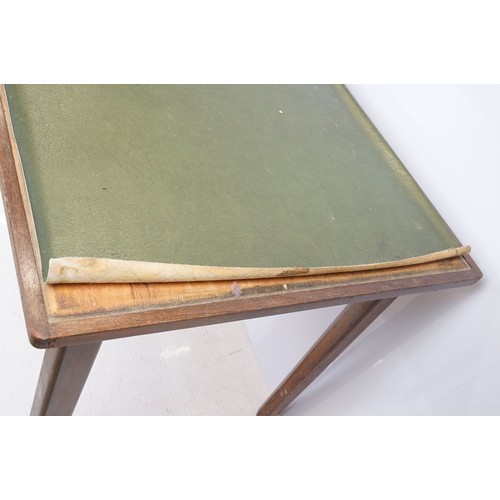 693 - Mid century mahogany table with green leatherette inset top, on square tapering legs, marked undersi... 