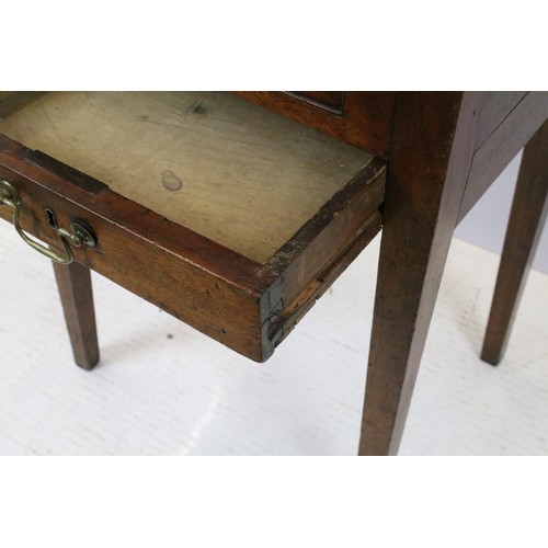 740 - Victorian mahogany sewing box table, the oval lift up lid revealing storage inside, with one faux dr... 