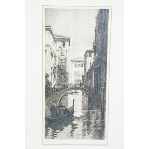 543 - Pair of fine signed etchings of Venetian canal scenes with gondolas and bridge, both having blind st... 