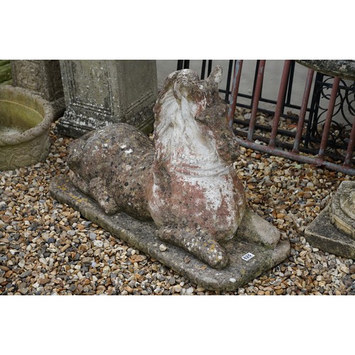 625 - Large reconstituted stone recumbent horse, approx 63cm high