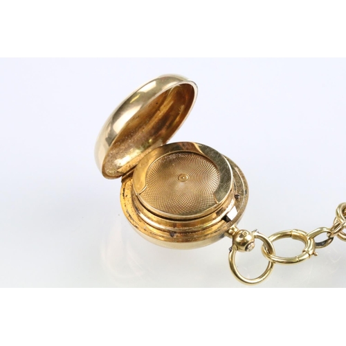 15 - 18ct gold figaro link pocket watch chain complete with T bar and spring ring clasp, mounted with an ... 