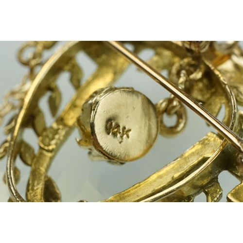 16 - 14ct gold and cultured pearl floral garland brooch. The brooch in the form of a U shaped foliate gar... 