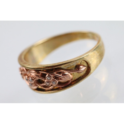 17 - Clogau two tone 9ct gold ring having a pierced foliate knot to head set with diamond accent stones. ... 