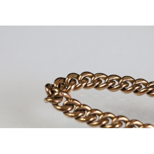 19 - Early 20th Century 9ct gold curb link watch chain having a T bar, dog lead clasp, and spring ring. E... 