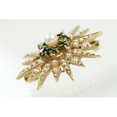 20 - 9ct gold hallmarked green stone and star brooch. The brooch set with a round pearl to the centre sur... 