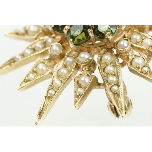 20 - 9ct gold hallmarked green stone and star brooch. The brooch set with a round pearl to the centre sur... 