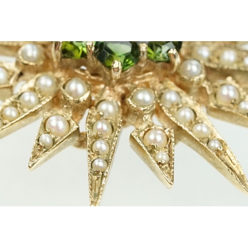 20 - 9ct gold hallmarked green stone and star brooch. The brooch set with a round pearl to the centre sur... 