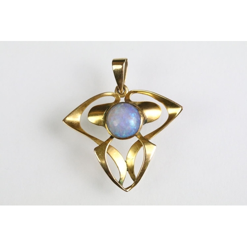 32 - Early 20th Century Art Nouveau 9ct gold and opal pendant of whiplash form with a round opal cabochon... 