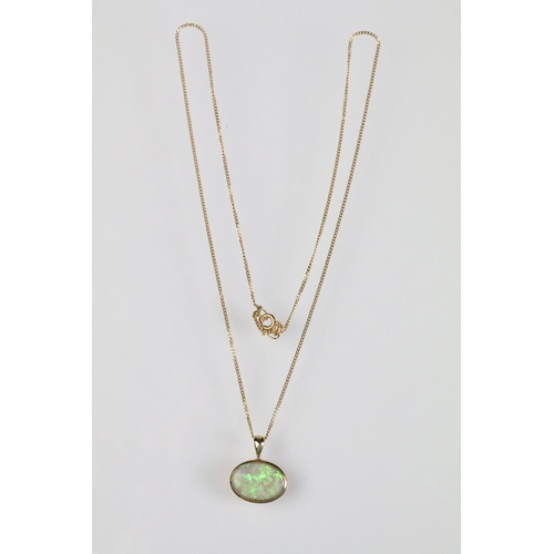 42 - 14ct gold opal pendant set to a 9ct gold fine link chain together with a pair of 14ct gold and opal ... 