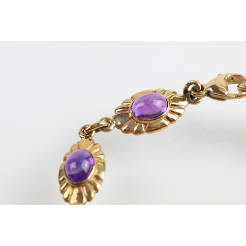 44 - 9ct gold and amethyst necklace, bracelet, earrings and ring. Each piece being set with amethyst cabo... 