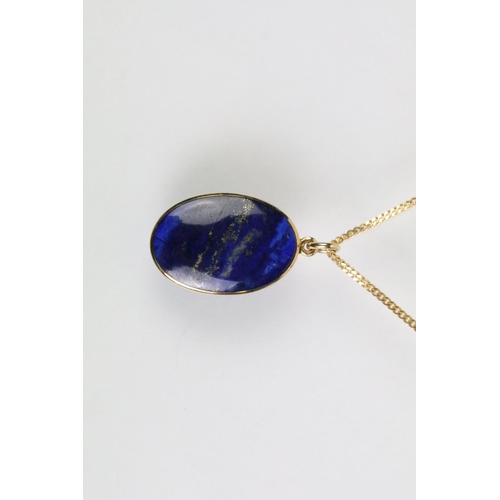 52 - 9ct and lapis lazuli necklace, bracelet and earrings. The bracelet set with seven lapis lazuli caboc... 