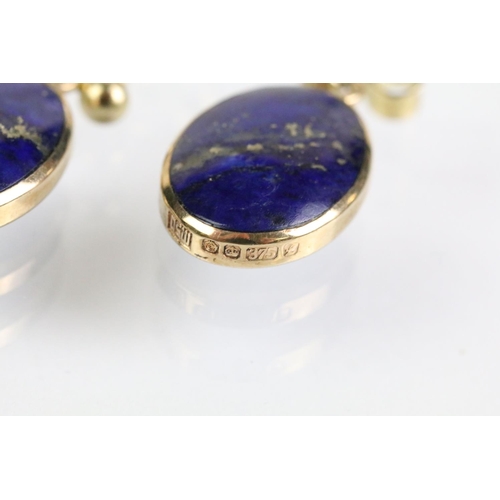 52 - 9ct and lapis lazuli necklace, bracelet and earrings. The bracelet set with seven lapis lazuli caboc... 