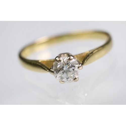 62 - 18ct gold and diamond solitaire ring. The ring prong set with a round old cut diamond. Diamond estim... 